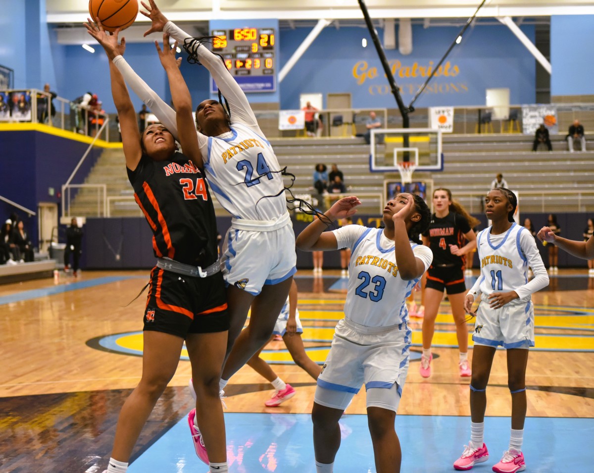 Putnam City West senior and University of Oklahoma signee Caya Smith (24) goes up for a rebound during a recent game.