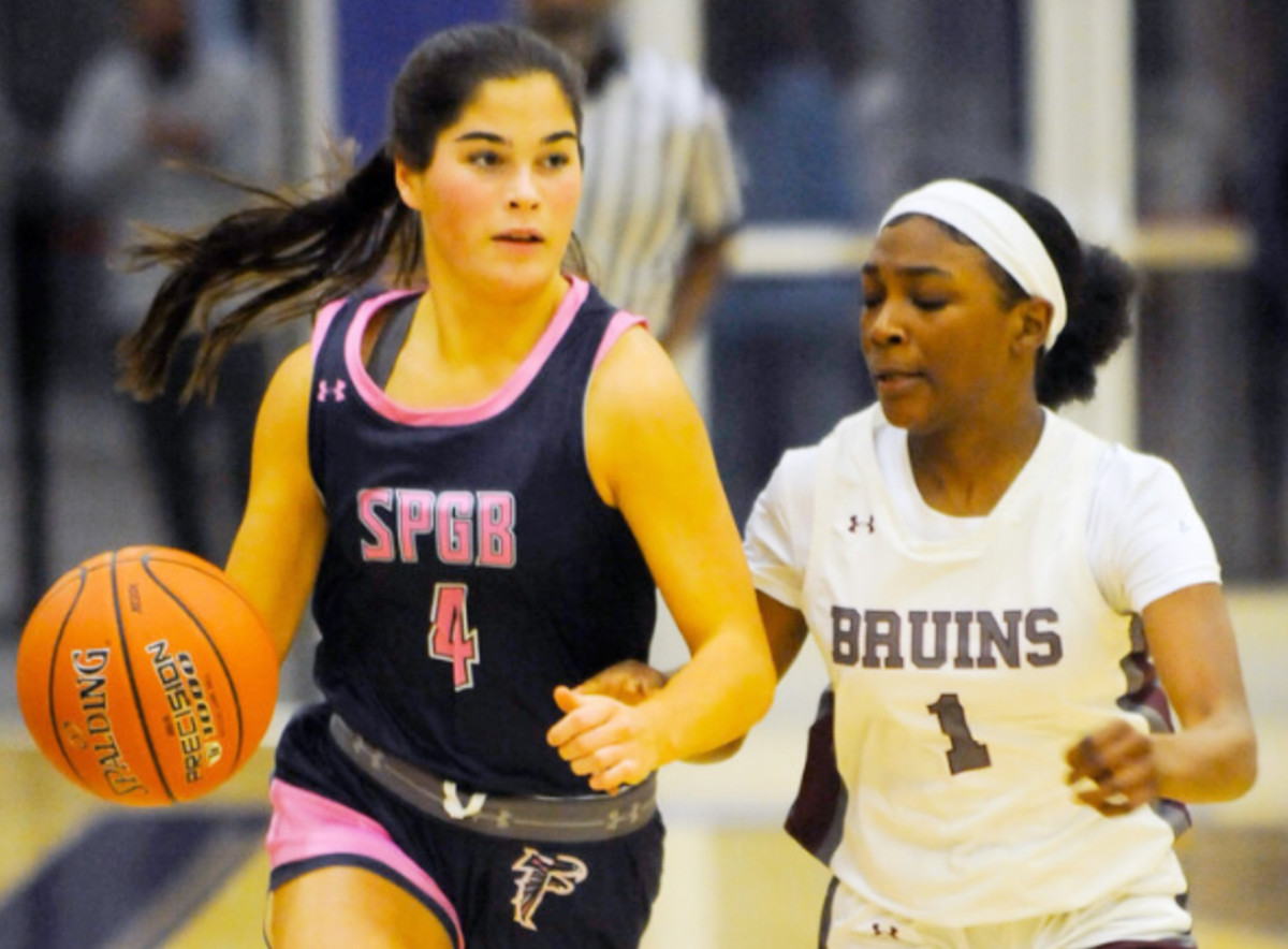 Sophomore Maria Bragg (left) is one of several multi-sport athletes playing basketball for Severna Park (Md.) High. The Falcons are 15-2 this season. (Photo courtesy of the Severna Park Voice)