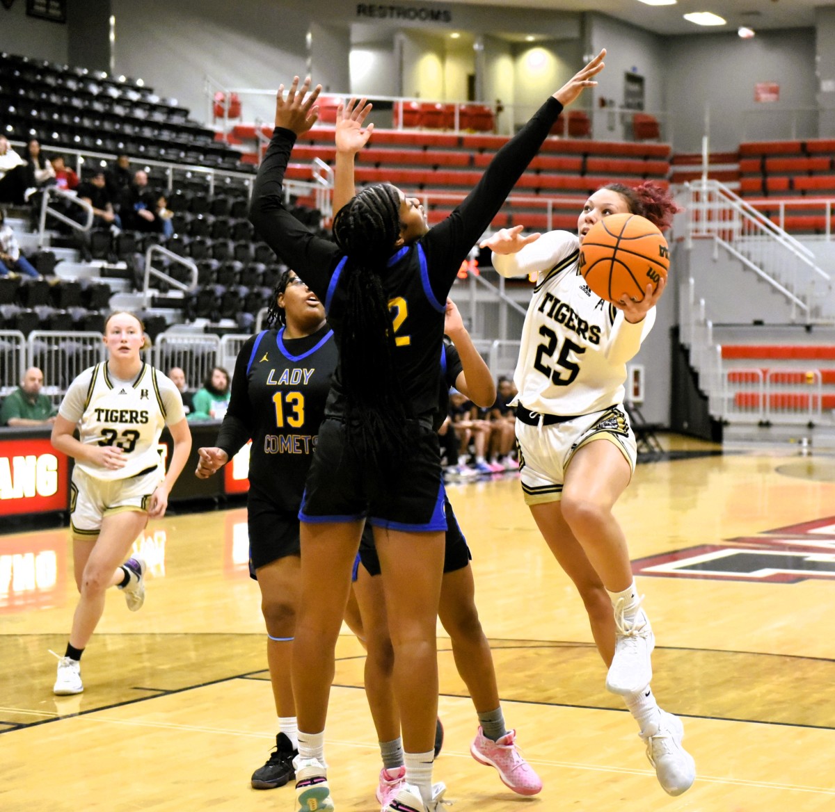 Broken Arrow junior guard McKenzie Mathurin (with ball) drives in for a shot during a recent game. Mathurin has committed to play college basketball at the University of Nebraska.
