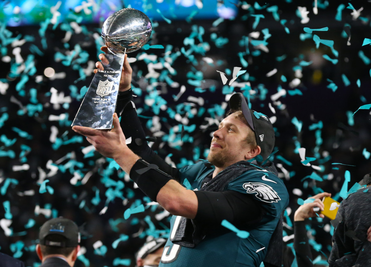 Philadelphia Eagles quarterback Nick Foles hoists the Vince Lombardi Trophy after a victory against the New England Patriots in Super Bowl LII at U.S. Bank Stadium in 2018. 
