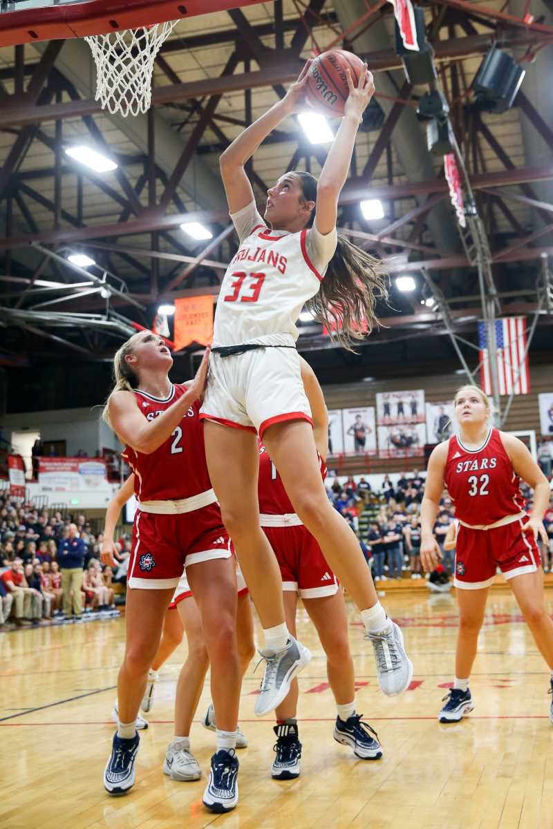 Center Grove Rachel Wirts (33) goes up for a lay up as Bedford North Lawrence takes on Center Grove High School in the Girls Class 4A IHSAA Region 7 basketball championship, Feb 10, 2024