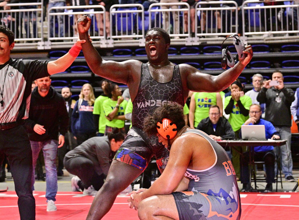 Vandegrift's Jacob Henry reacts to beating Bridgeland's Omar Kahn in the state semifinals of the 285 pound weight class on Saturday in Cypress, Texas.