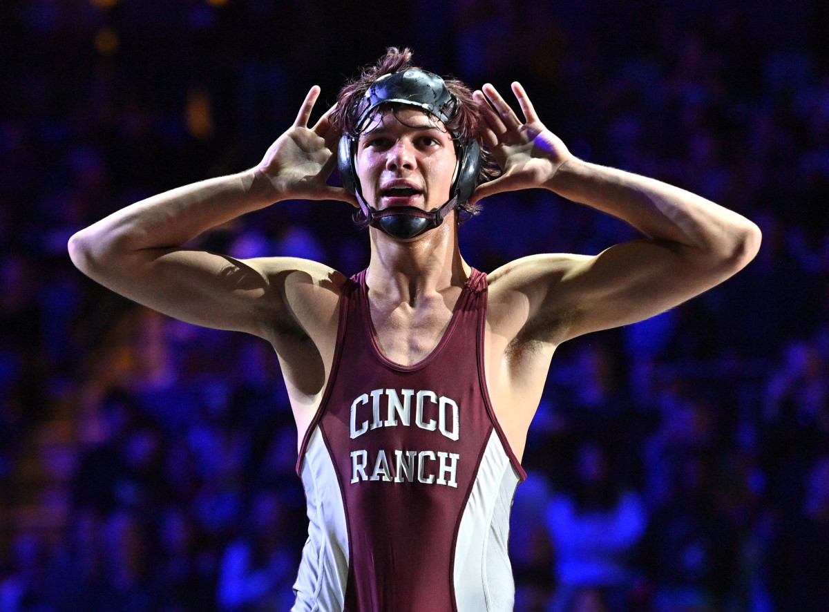 Katy Cinco Ranch's Jackson Herman celebrates his state victory at 132 pounds, defeating Cayden Rios of El Paso Eastwood.
