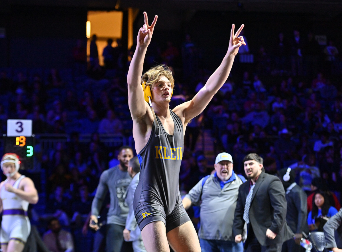 Klein's Isaac Sheeren celebrates winning his second UIL state title — this one at 144 pounds — on Saturday at the Berry Center in Cypress.