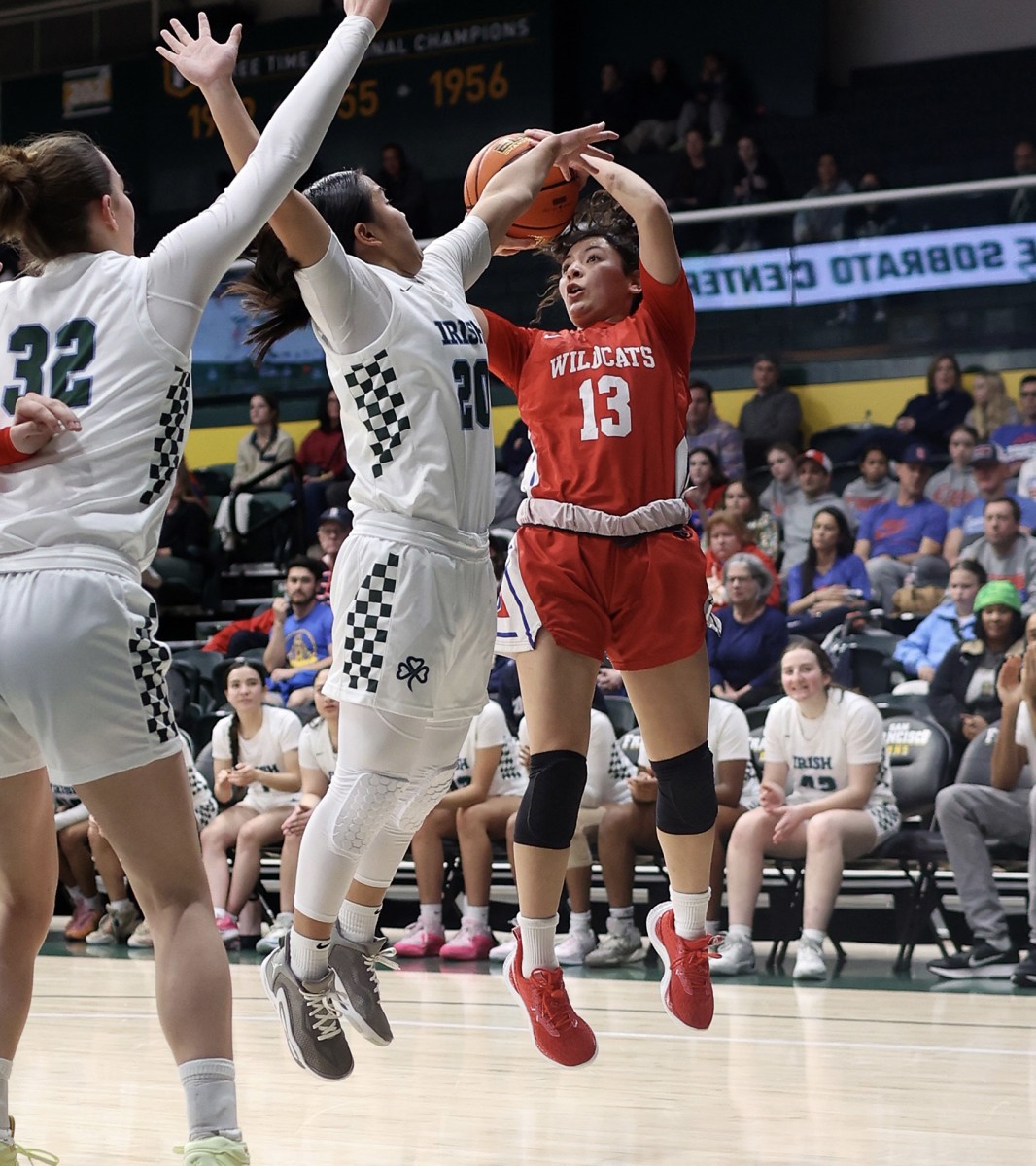 Sophia Sanchez with a jumper against great defense from SHC's Reza Po at USF earlier this season. 