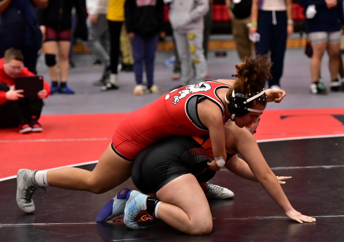 Del City sophomore Chloe Daniels takes down her opponent during a recent wrestling match. Daniels will be competing in the upcoming Class 6A girls state tournament in Oklahoma City.
