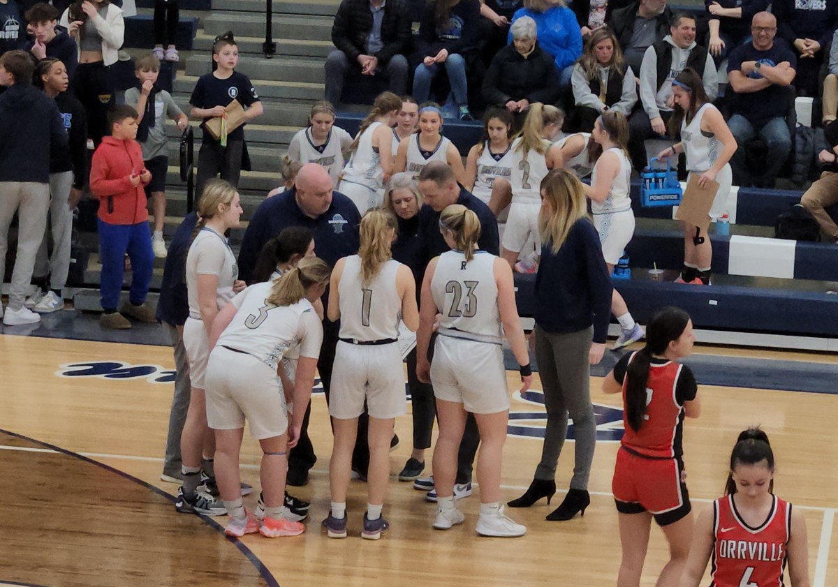 Rootstown head coach Joe Leonard talks to his team before a sectional final game against Orrville on February 24, 2024