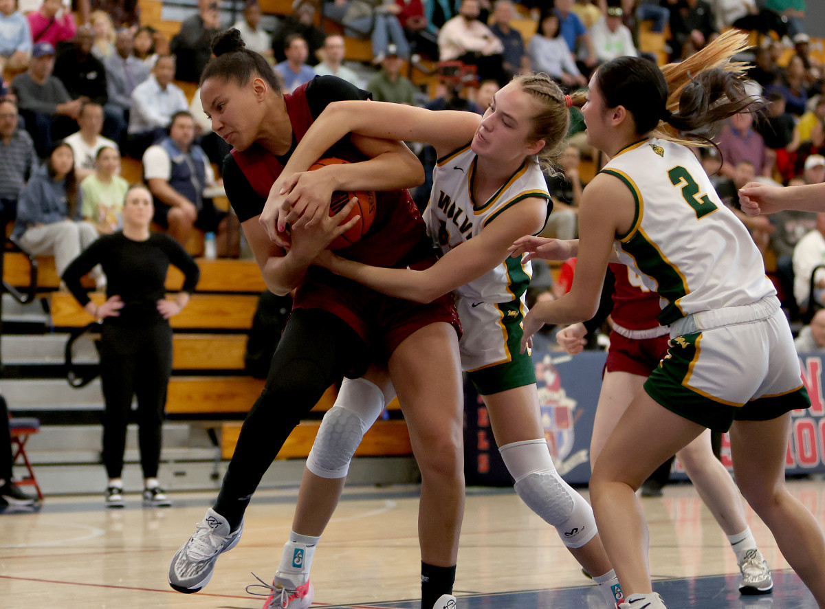 Taissa Queiroz (left) and San Ramon Valley tussled fiercely throughout Saturday's game.