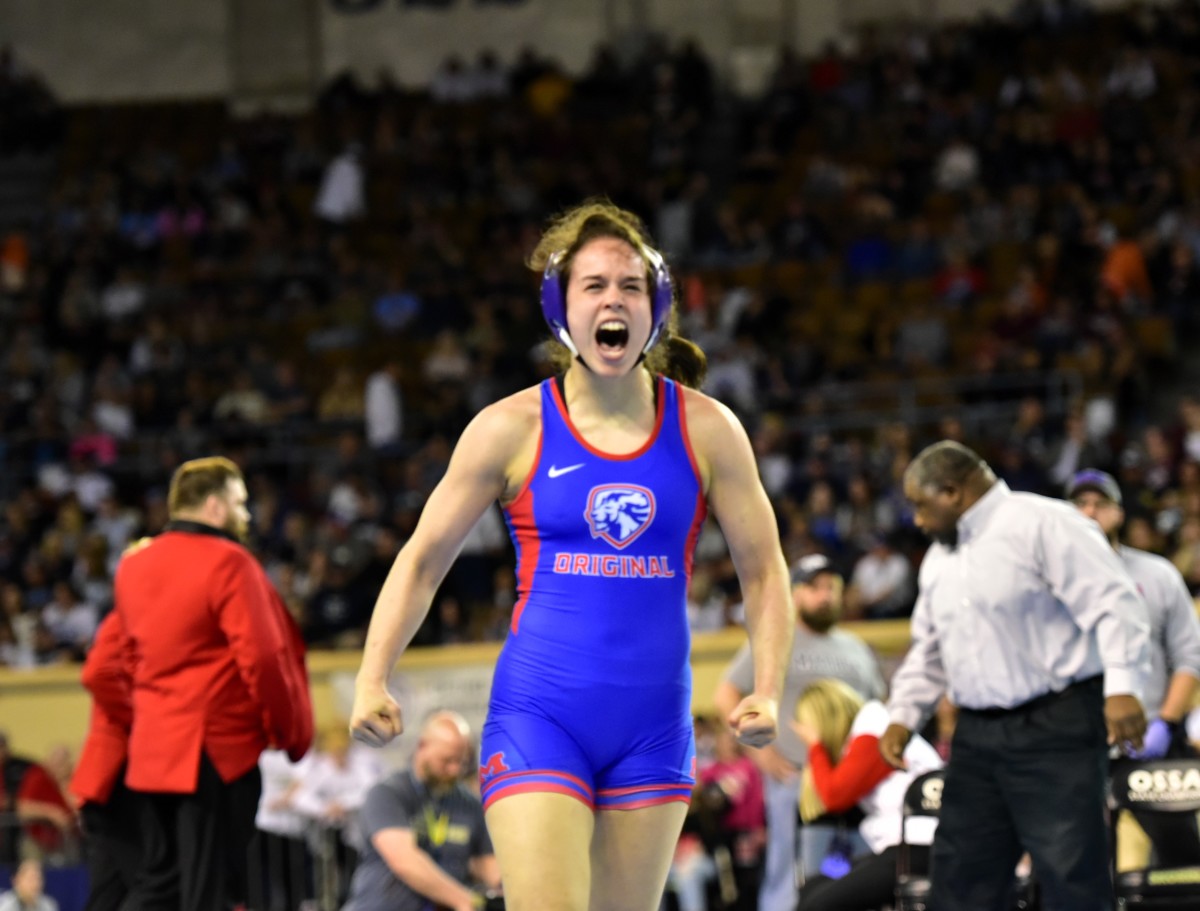 Moore's Shelby Kemp reacts after claiming the Class 6A girls 135-pound weight class title with a pin fall. Kemp was named the Most Outstanding Wrestler at the 6A tournament on Feb. 24, 2024.
