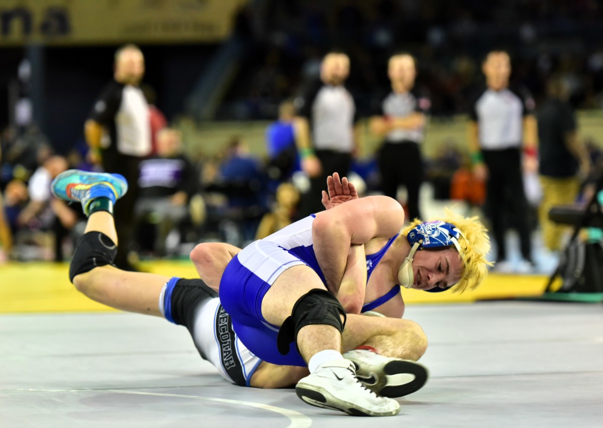 Vinita wrestler Zane Donley goes up against Checotah's Colt Collett in the Class 3A 126-pound weight class finals on Feb. 24, 2024. Collett eventually posted a 9-7 decision against Donley for the title.