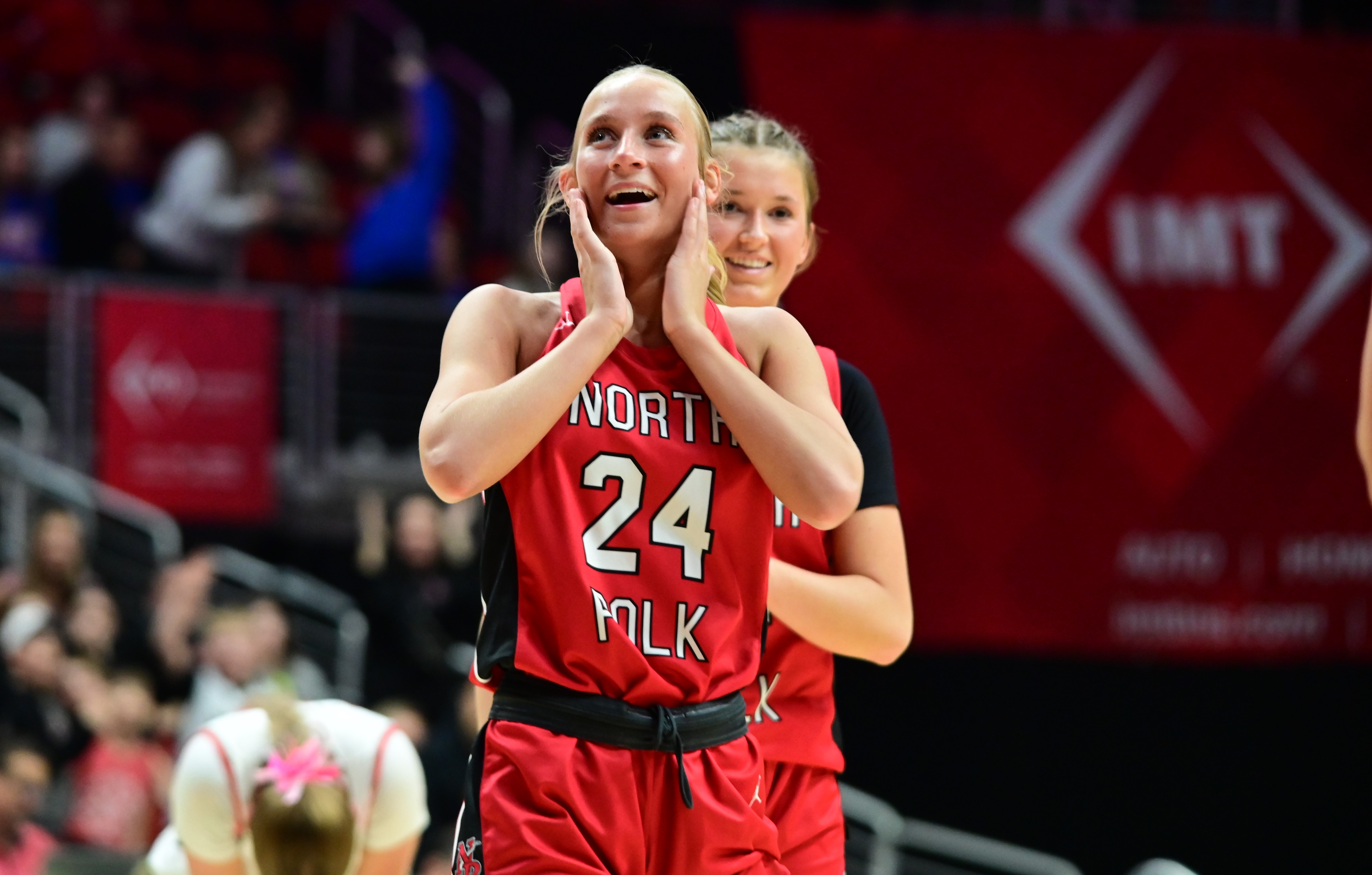 North Polk's Jada Podey celebrates a win over Dallas Center-Grimes during a Class 4A state tournament quarterfinal Tuesday at Wells Fargo Arena in Des Moines. (Photo by Ryan Timmerman)