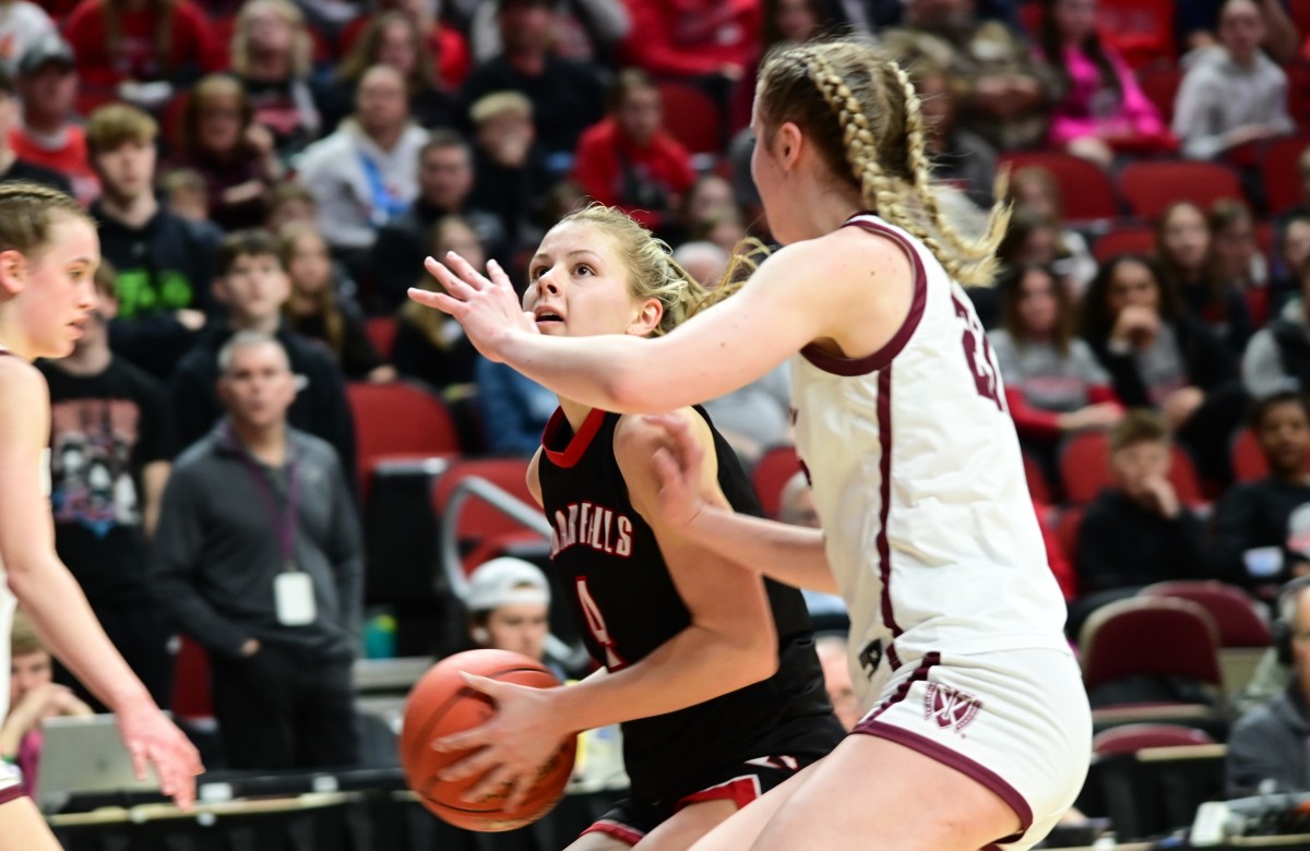 Cedar Falls' Grace Knutson goes up for a shot attempt against Dowling Catholic during a Class 5A semifinal game at Wells Fargo Arena in Des Moines on Thursday.(Photo by Ryan Timmerman)