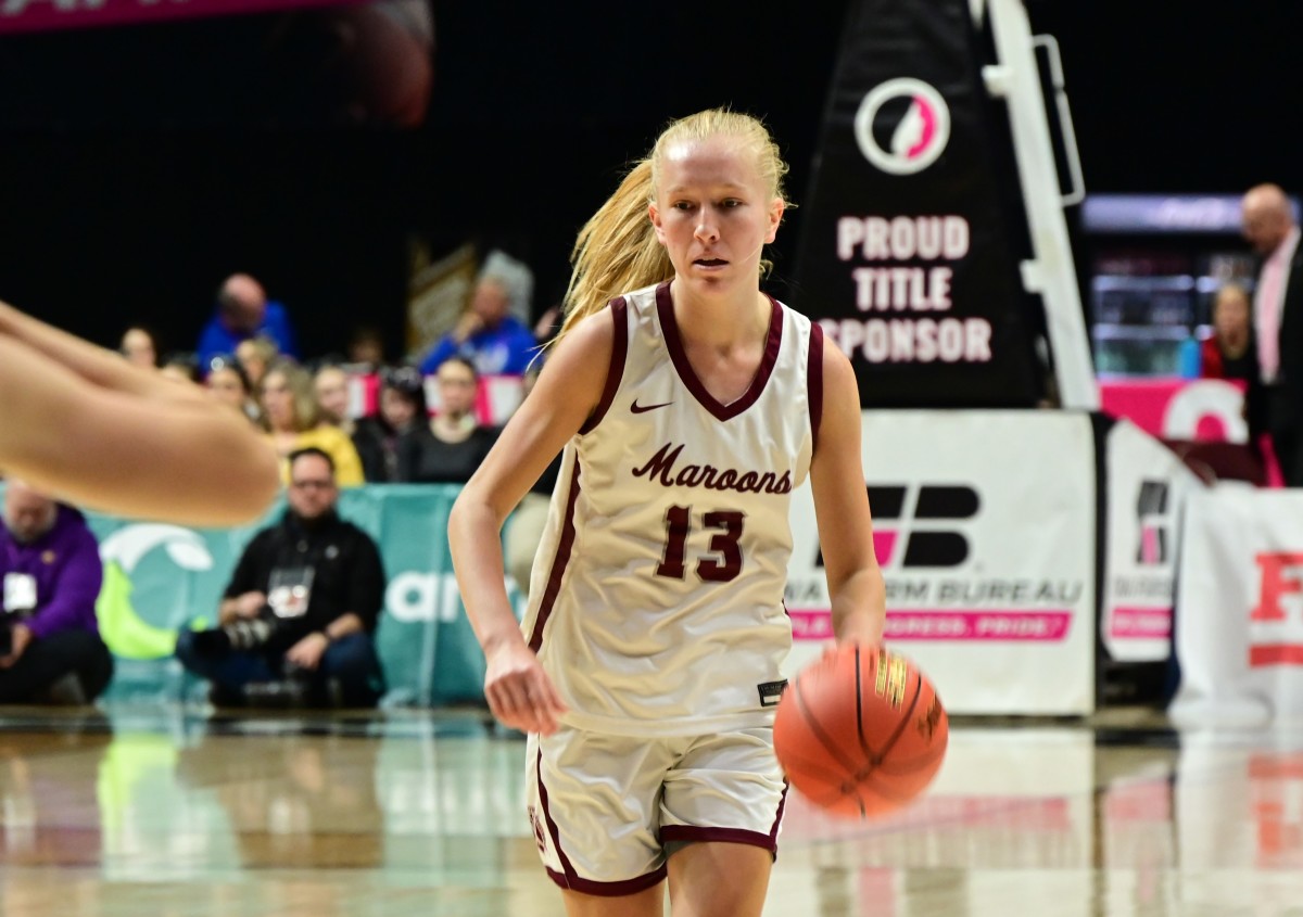 Dowling Catholic's Ava Zediker dribbles up the court against Cedar Falls during a Class 5A semifinal game against Cedar Falls at Wells Fargo Arena in Des Moines on Thursday.(Photo by Ryan Timmerman)