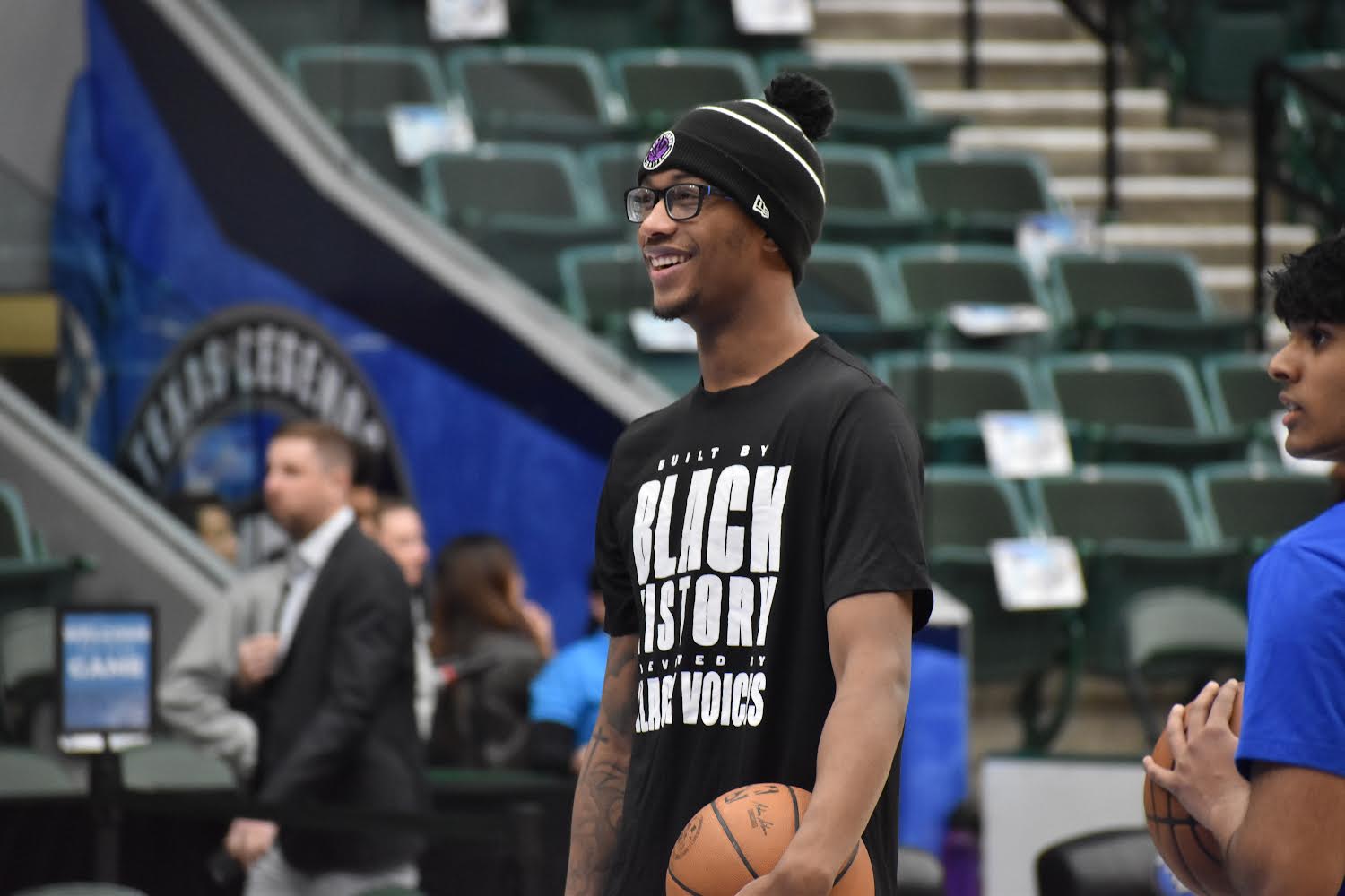 Ron Holland looks on as his G League Ignite teammates warm up for a game in Frisco, Texas on Feb. 29.