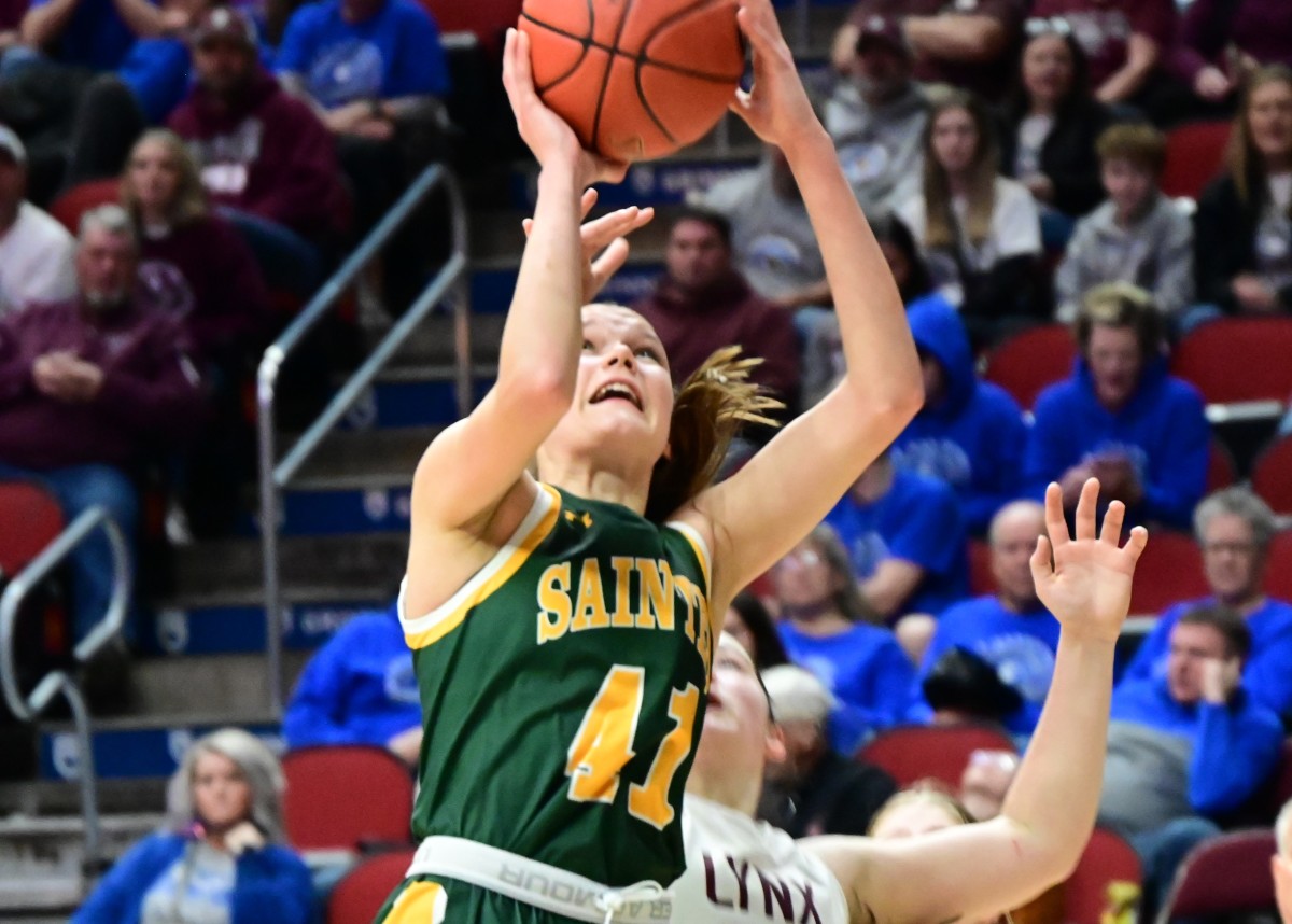Council Bluffs St. Albert's Avah Underwood drives to the hoop against North Linn during a Class 1A state tournament semifinal Friday at Wells Fargo Arena in Des Moines. (Photo by Ryan Timmerman)