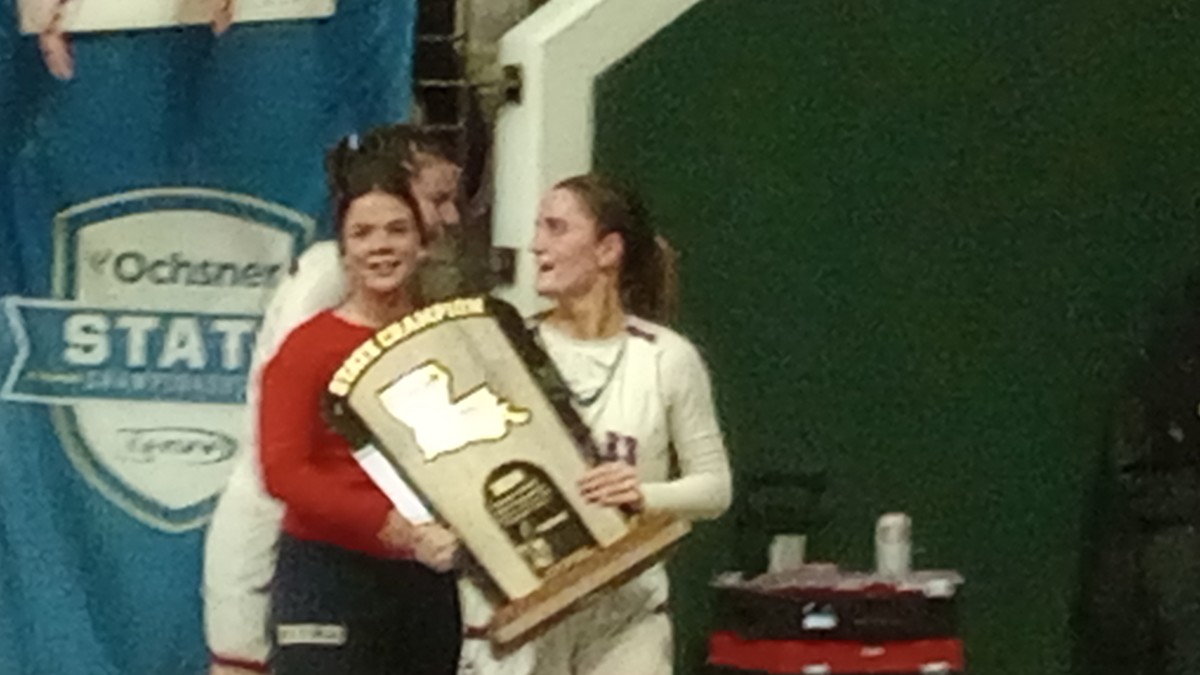 Parkview Baptist senior Addyson Bernhard holds the title trophy after the Lady Eagles repeated as Division III select state champions March 1, 2024.