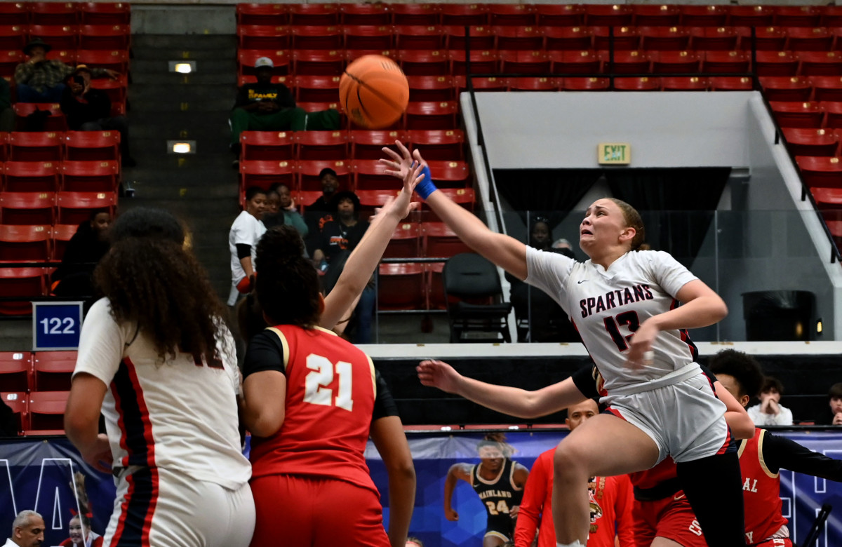Miami Country Day freshman guard Jalynn Belton drives through the lane during the Class 3A state championship at the RP Funding Center in Lakeland on Friday. 