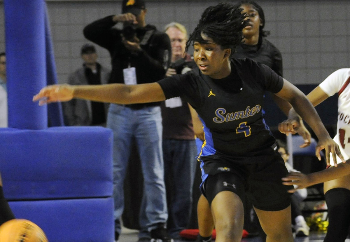 Sumter's Rickell Brown reaches for a loose ball during the 2024 SCHSL Class 5-A Girls Basketball State Championship Game. (3/1/2024)