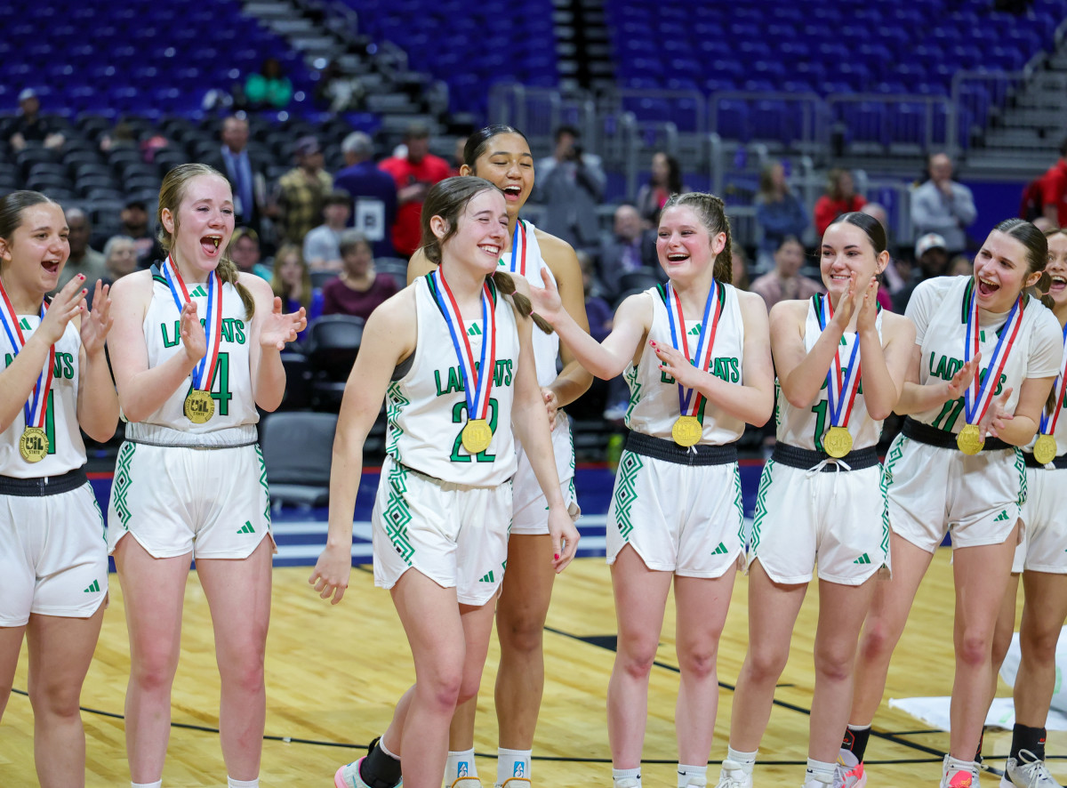 Mattie Dollar smiles after receiving Class 1A state championship game MVP honors on Saturday at the Alamodome after Newcastle beat Turkey Valley.