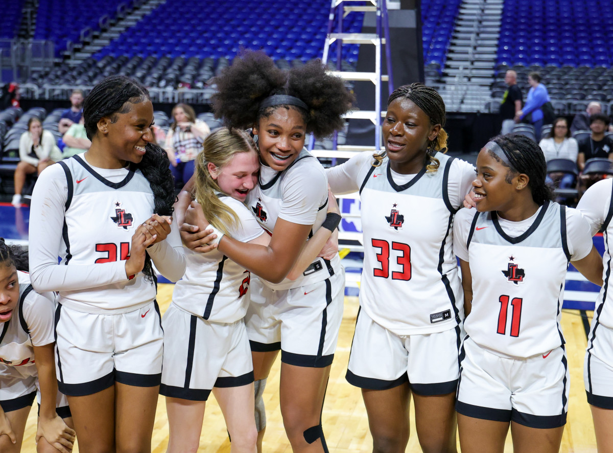 Frisco Liberty celebrates its repeat UIL Class 5A state title, which it won on Saturday over Mansfield Timberview, 60-51.
