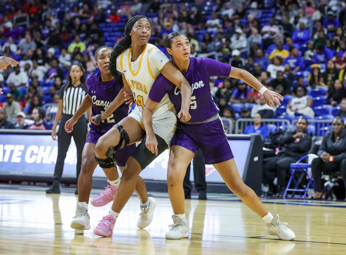 Canyon, La Vega battle for a rebound in the Texas (UIL) Class 4A state championship in San Antonio.