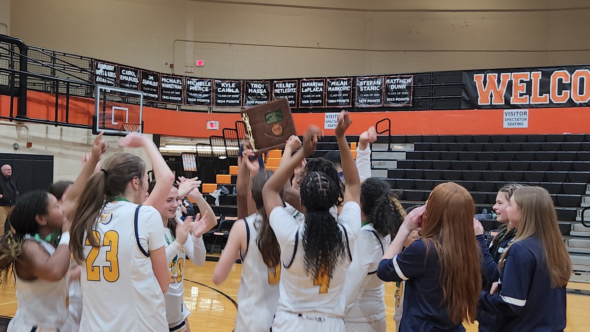 Streetsboro celebrates winning district championship with win over Norton on March 2, 2024