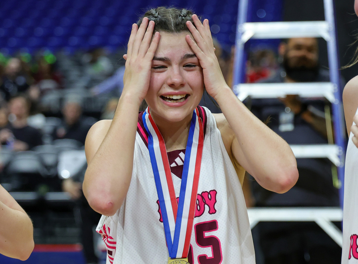 Martin's Mill freshman guard Kara Nixon reacts to receiving UIL 2A state championship MVP honors after hitting a game-winning shot at the buzzer to lift the Mustangs to glory.