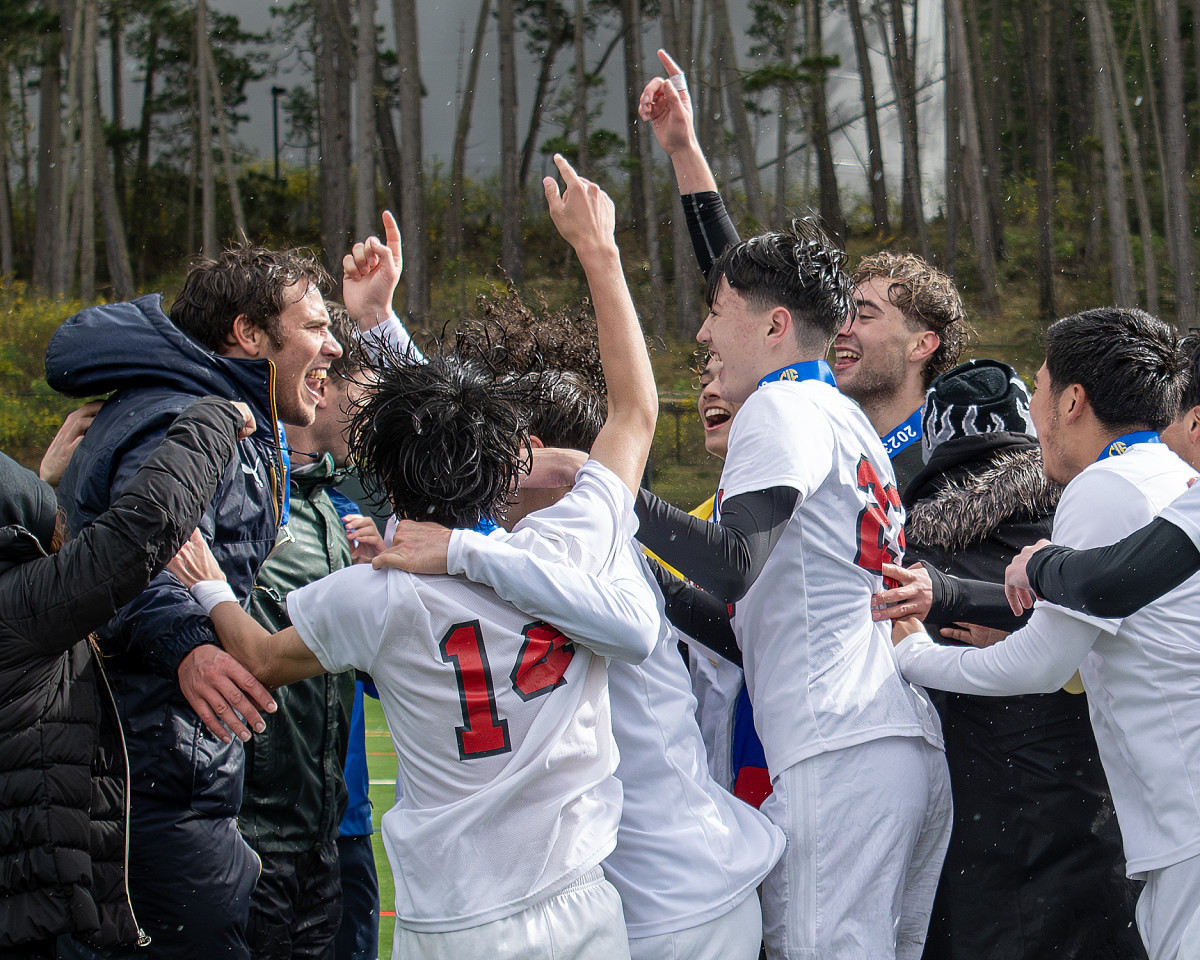 George Washington High head coach Dante Popalisky, left, celebrates with his team after beating Stevenson school for the CIF Nor Cal Division V Championship in Pebble Beach on March 2