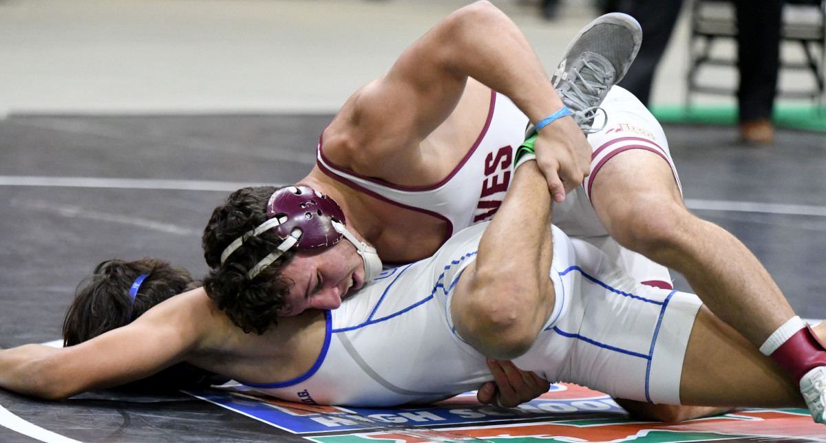 Lake Gibson senior Gianni Maldonado battles his way to the Class 2A 157-pound wrestling state championship on Saturday at Silver Spurs Arena in Kissimmee. 