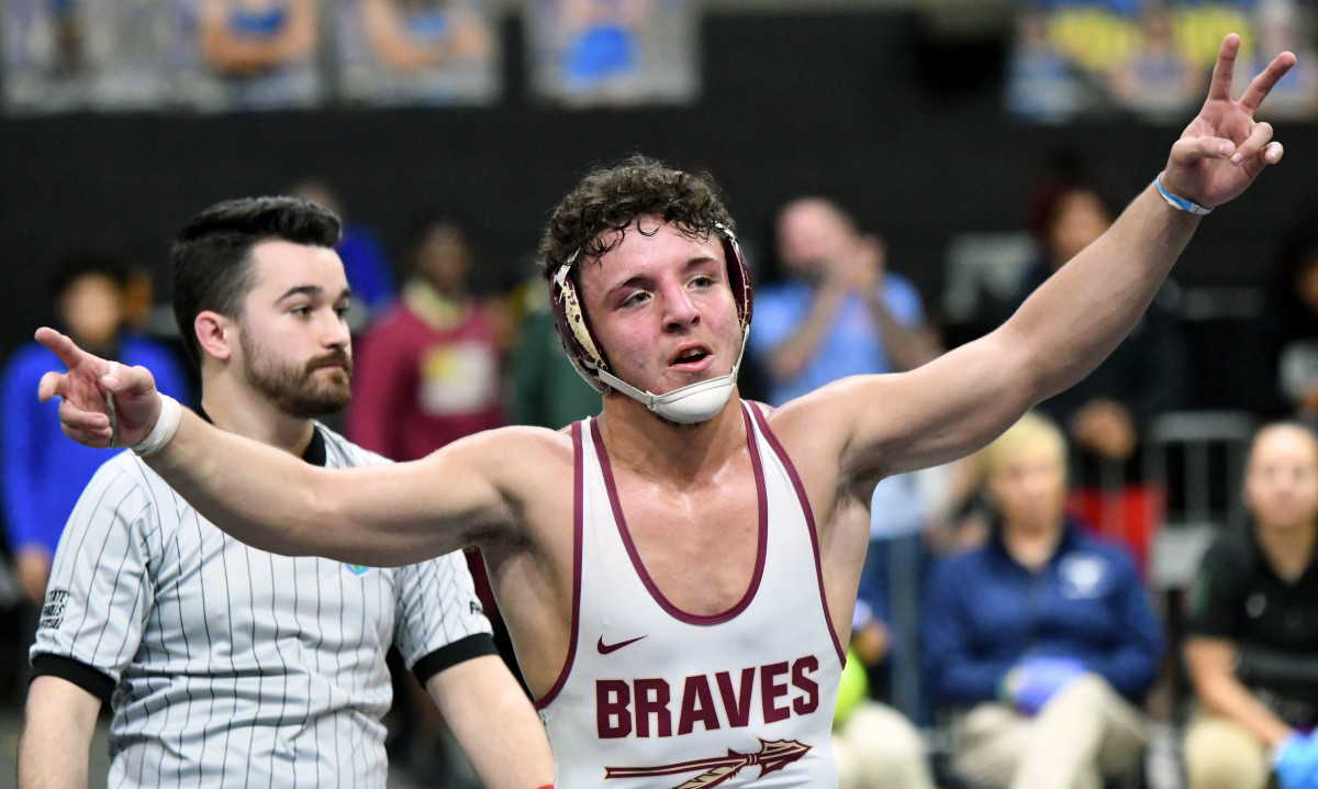Lake Gibson senior Gianni Maldonado reacts after winning Class 2A 157-pound wrestling state championship on Saturday at Silver Spurs Arena in Kissimmee. It was the second straight state title of his career. 