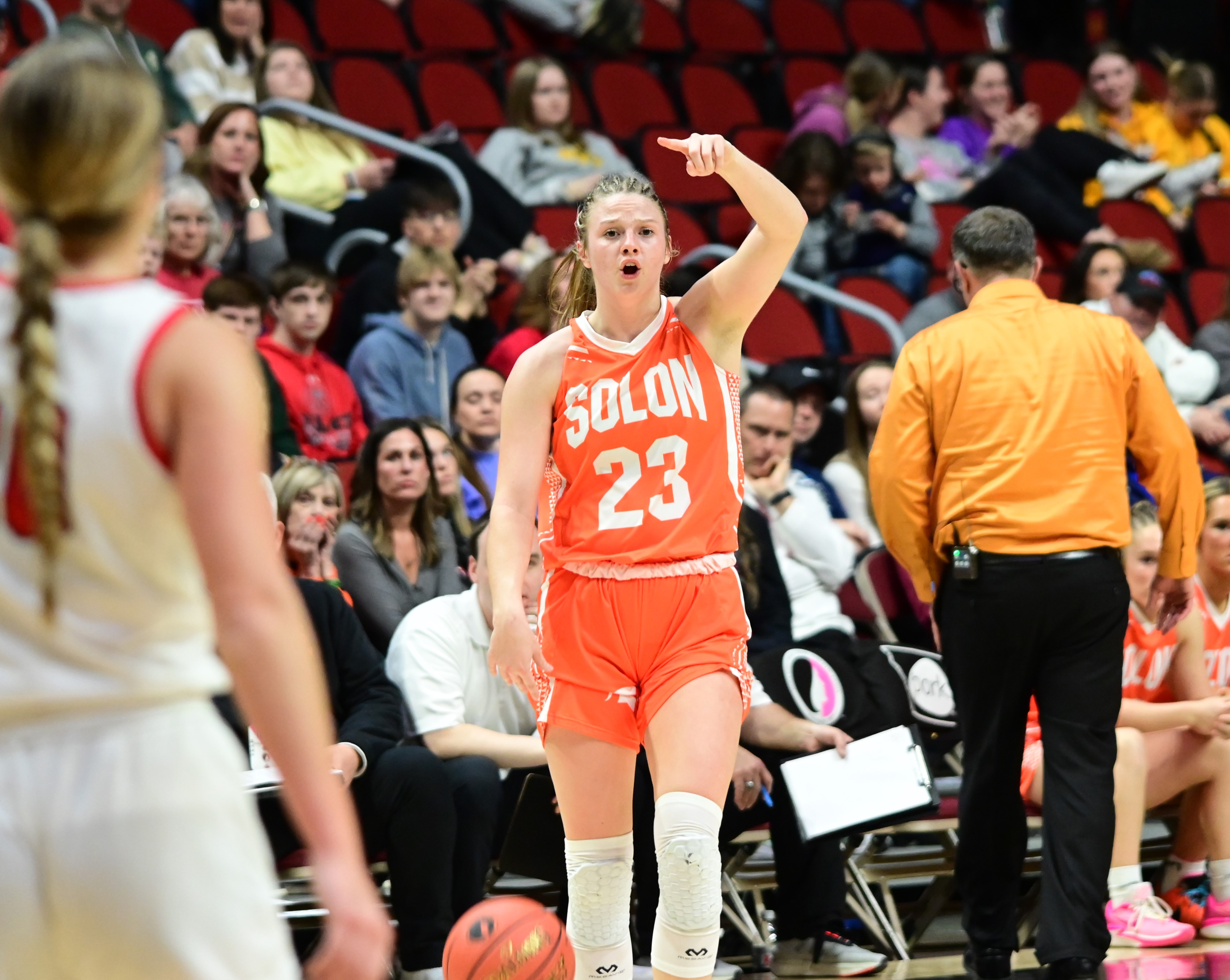 Solon's Callie Levin dribbles up the court and calls an offensive play during the Class 3A state championship against Estherville Lincoln Central on Friday at Wells Fargo Arena in Des Moines. (Photo by Ryan Timmerman)