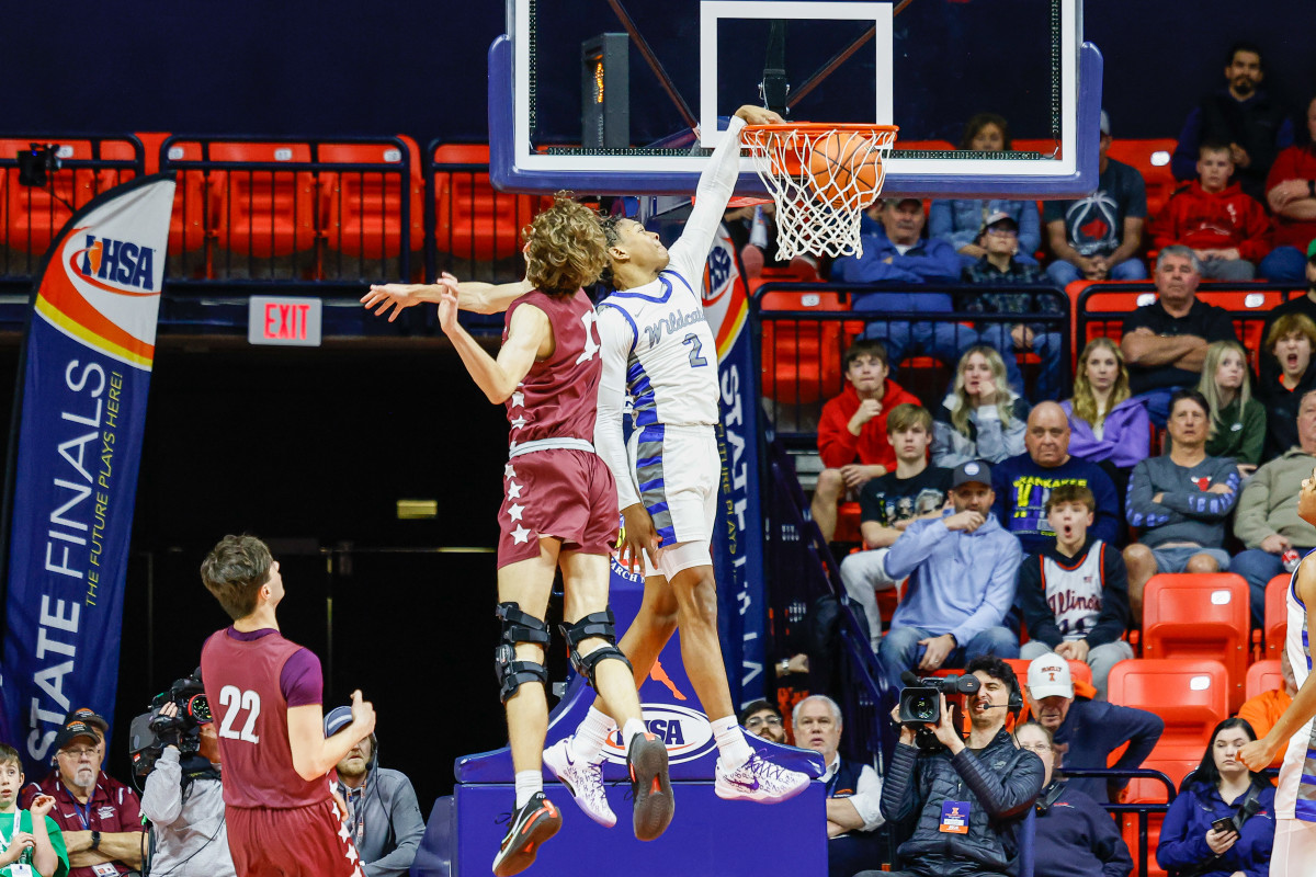 Phillips Academy junior guard EJ Horton throws a dunk in the fourth quarter of the Illinois Class 2A championship game. 