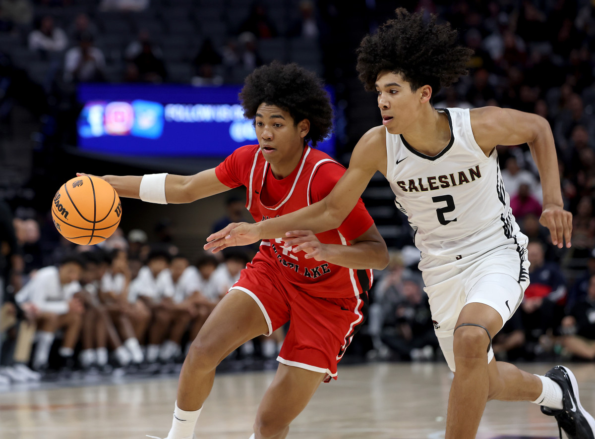 Harvard-Westlake (red) and Salesian played a rugged, intense, defensive battle, eventually pulled out by the Wolverines, 50-45, at Golden 1 Center in Sacramento on March 9, 2024. 