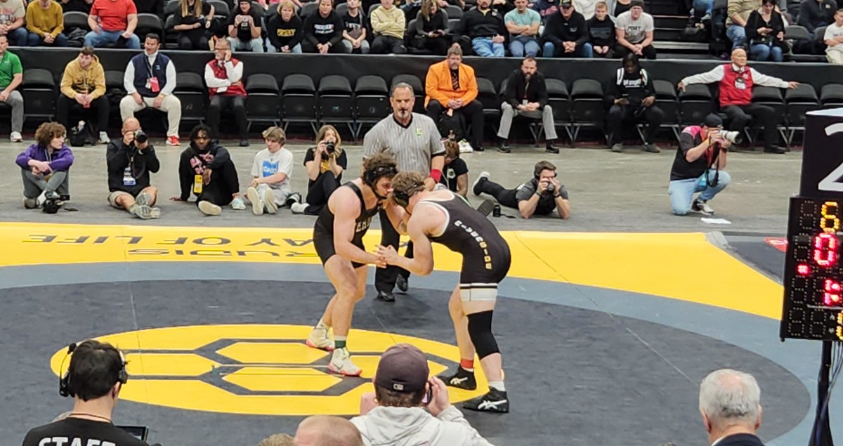 Aidan Fockler of Massillon Perry (left) and Antonio Bottiggi of Painesville Riverside (right) battle in the 285-pound OHSAA state championship match on March 10, 2024.