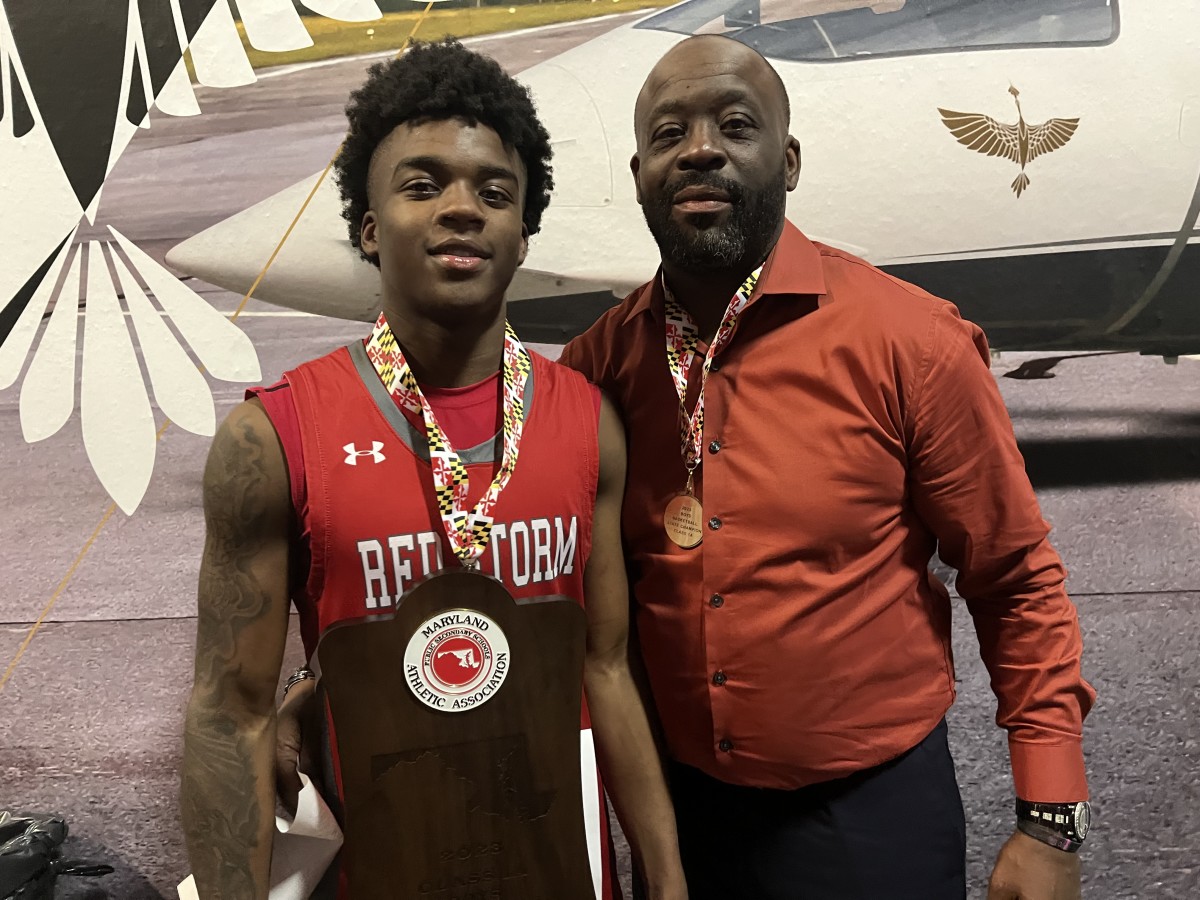 Edmondson, with DJ Dantzler (left) and his father and coach Darnell, won the Class 1A state title last March. The Red Storm continues its repeat bid Tuesday against Smithsburg in the state semifinals.