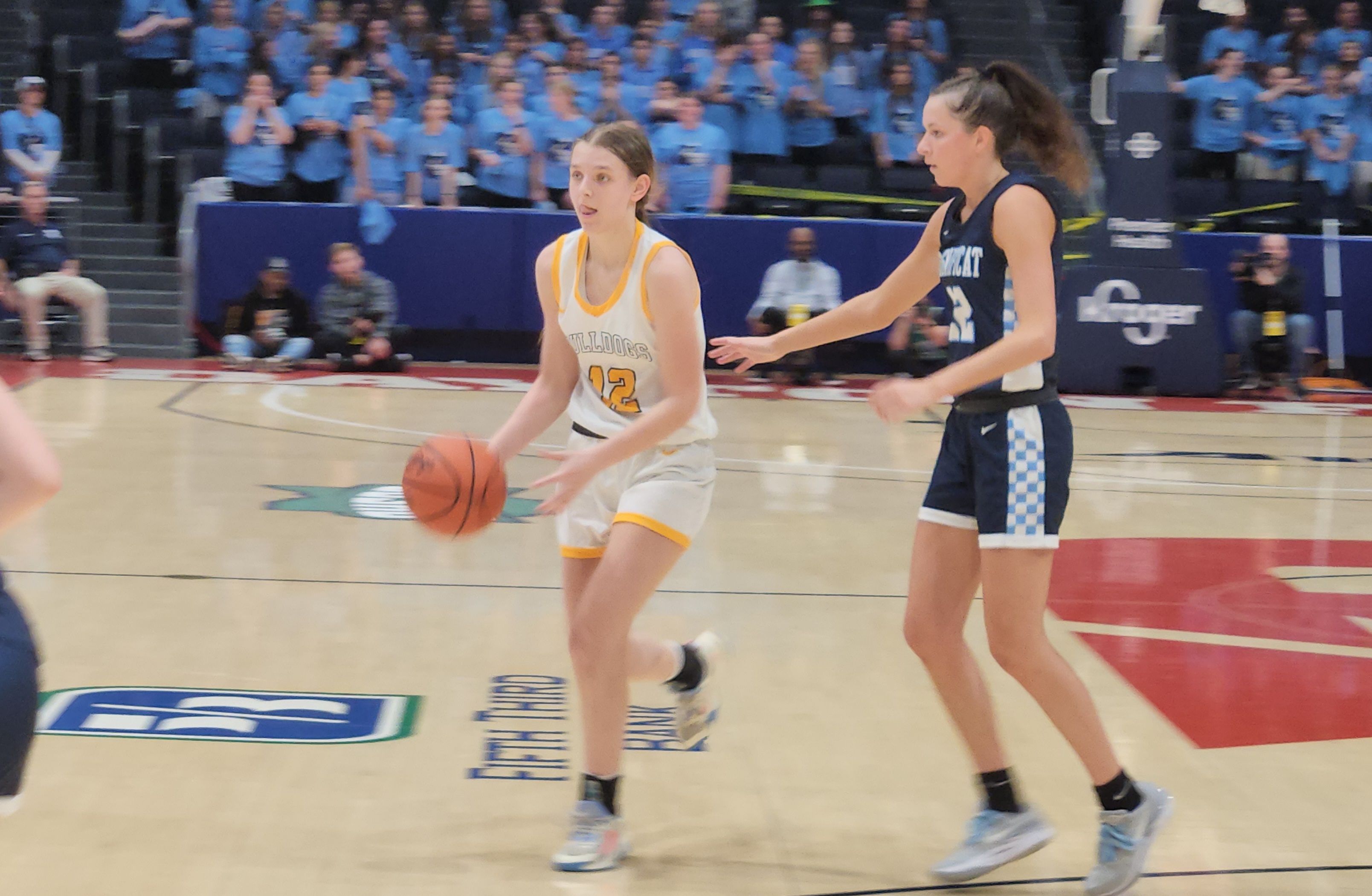 Danielle Cameron of Olmsted Falls dishes the ball to a teammate in the fourth quarter of the Bulldogs' win over Magnificat in the Division I state semifinals on March 15, 2024.