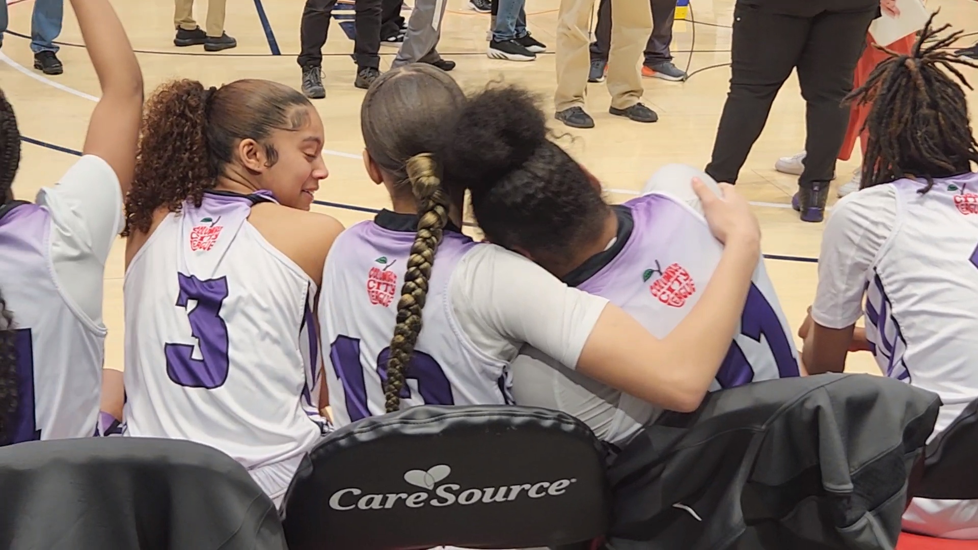 Africentric's Jayona Overby puts her arm around Natiah Nelson after the Lady Nubians won the 2024 OHSAA Division III state championship