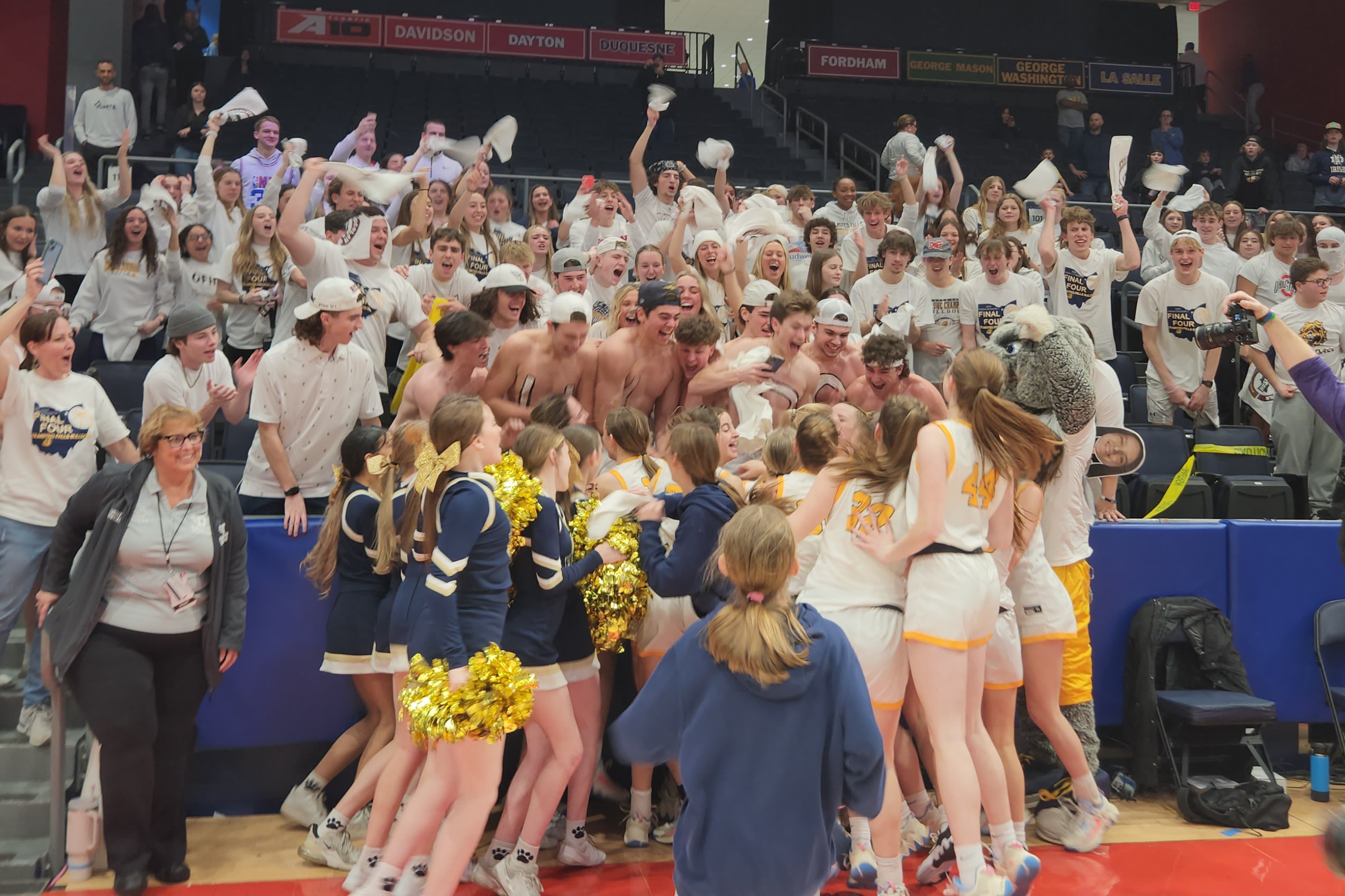 Olmsted Falls players celebrate with the student section after winning the OHSAA girls basketball Division I state title on March 16, 2024.