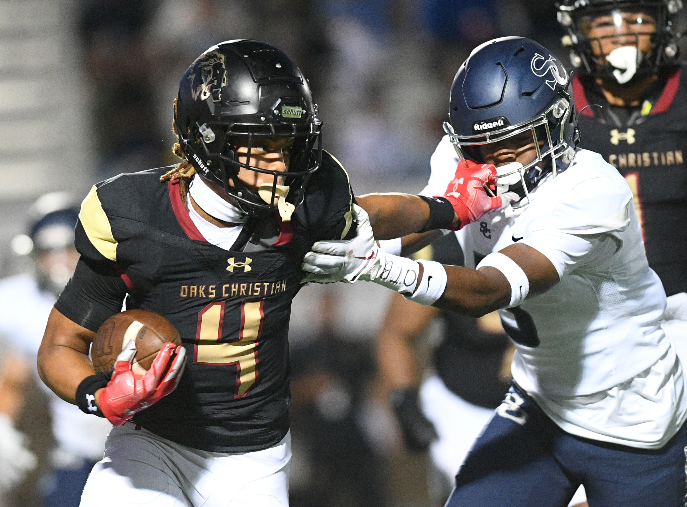 Oaks Christian running back Deshonne Redeaux carries the ball against Sierra Canyon. (Andy Holzman)