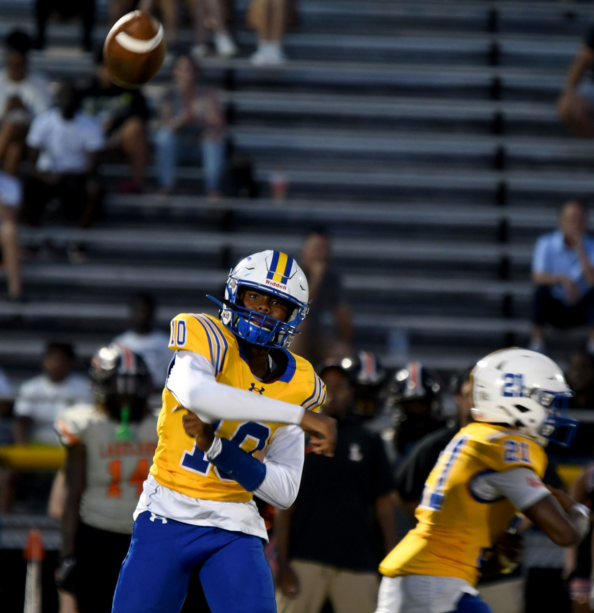 Largo quarterback Jeremy Thomas fires a pass out into the flat against Lakeland on Friday.