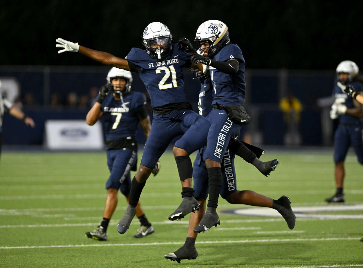 The St. John Bosco defense enjoys the moment during the Braves' 37-14 home win over St. Frances Academy on Friday. Photo: Heston Quan
