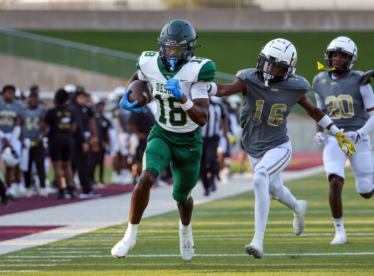 Ethan Feaster races to a touchdown during DeSoto's non-district win over South Oak Cliff in September.