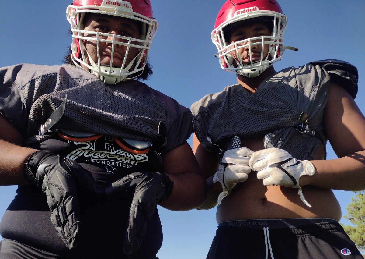 Pou Tatofi (left) and Paki Finau are connected on the Oak Hills offensive line and by blood. Photo: John Murphy