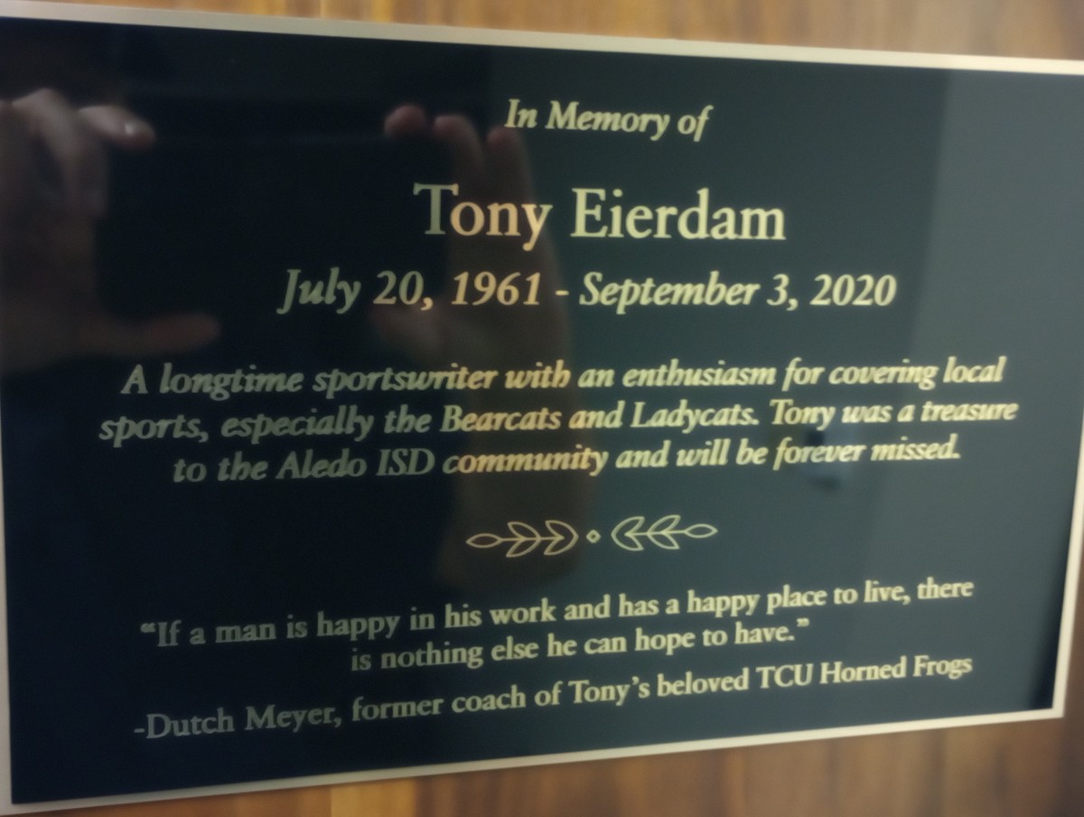 Plaque honoring Tony Eierdam in the press box at the stadium in Aledo, Texas.