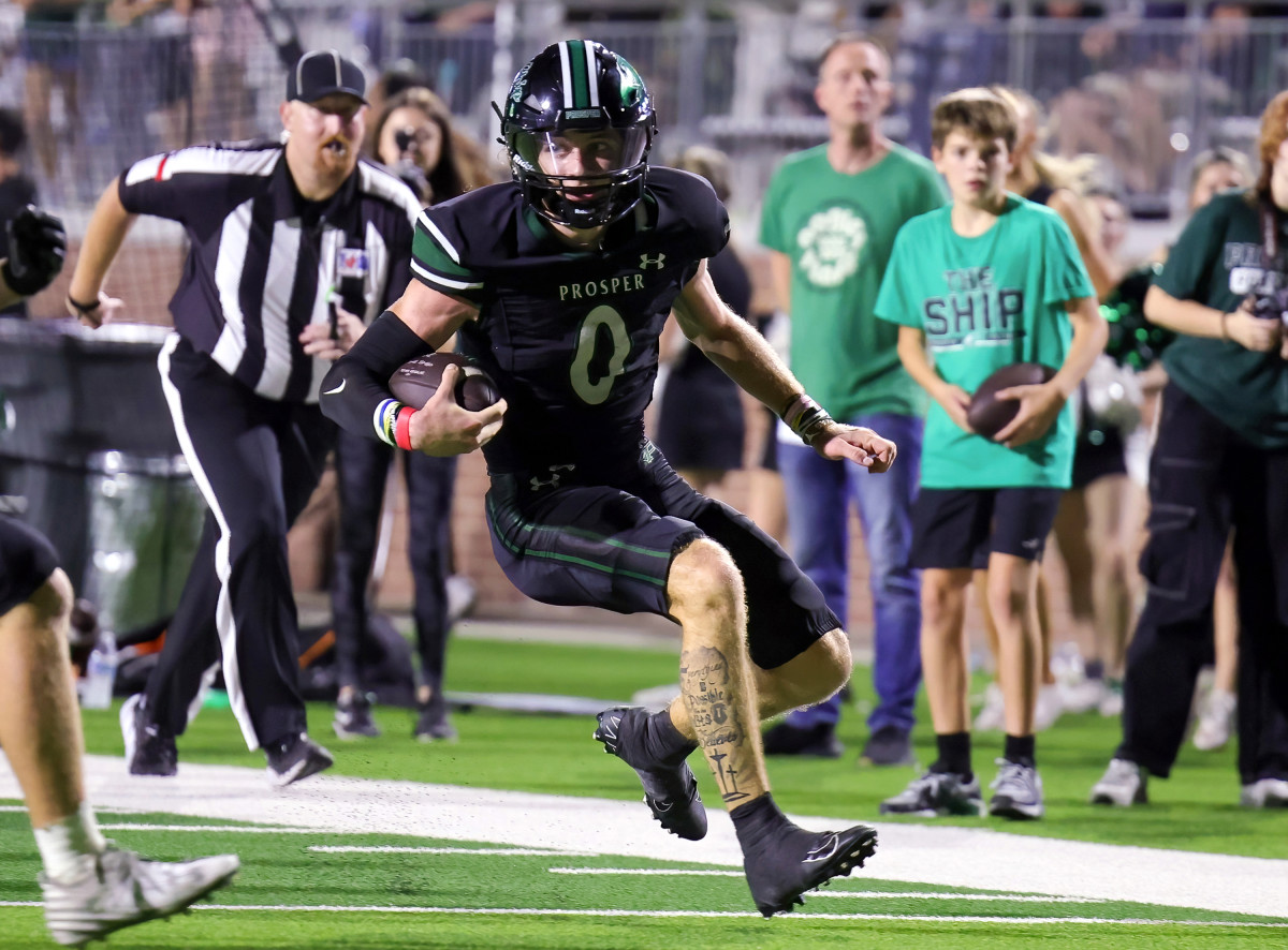 Prosper quarterback Nathan Tenbarge gets loose on a run duringa Texas high school football game. 