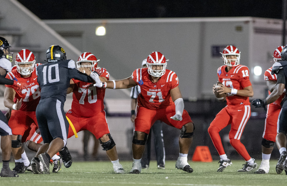 Mater Dei quarterback Elijah Brown looks downfield as his offensive line provides protection.