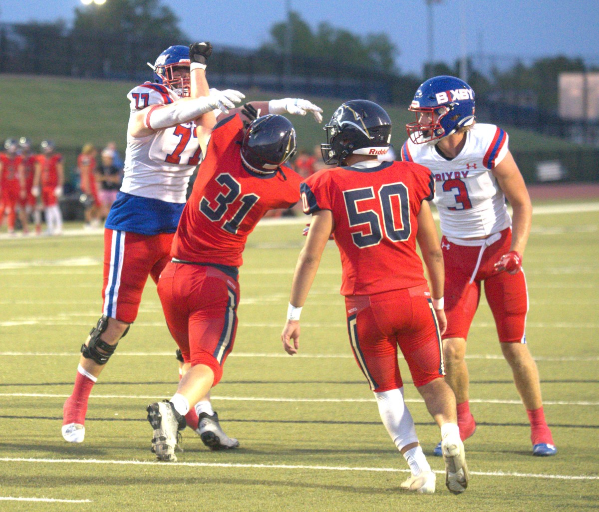 Bixby offensive tackle Brody Duffel (left) blocks a Southmoore player during the Spartans' 66-0 win on Sept. 28, 2023.