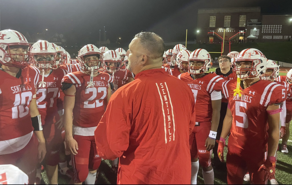 Fort Hill football Zack Alkire talks to his team before last Friday's kickoff against Mountain Ridge. The two-time defending Class 1A state champs avenged a loss to their Western Maryland rival last regular season with a 37-14 decision for their 14th straight victory. 10/11/2023
