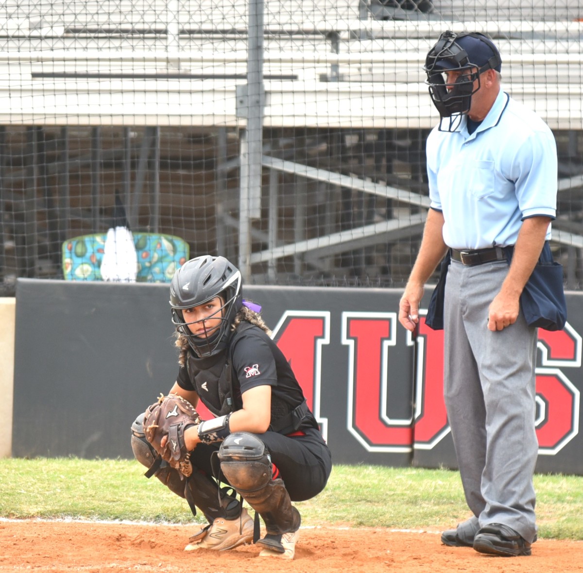 Mustang senior Arionna ‘Onna’ McElroy is in her first season as the team's starting catcher.