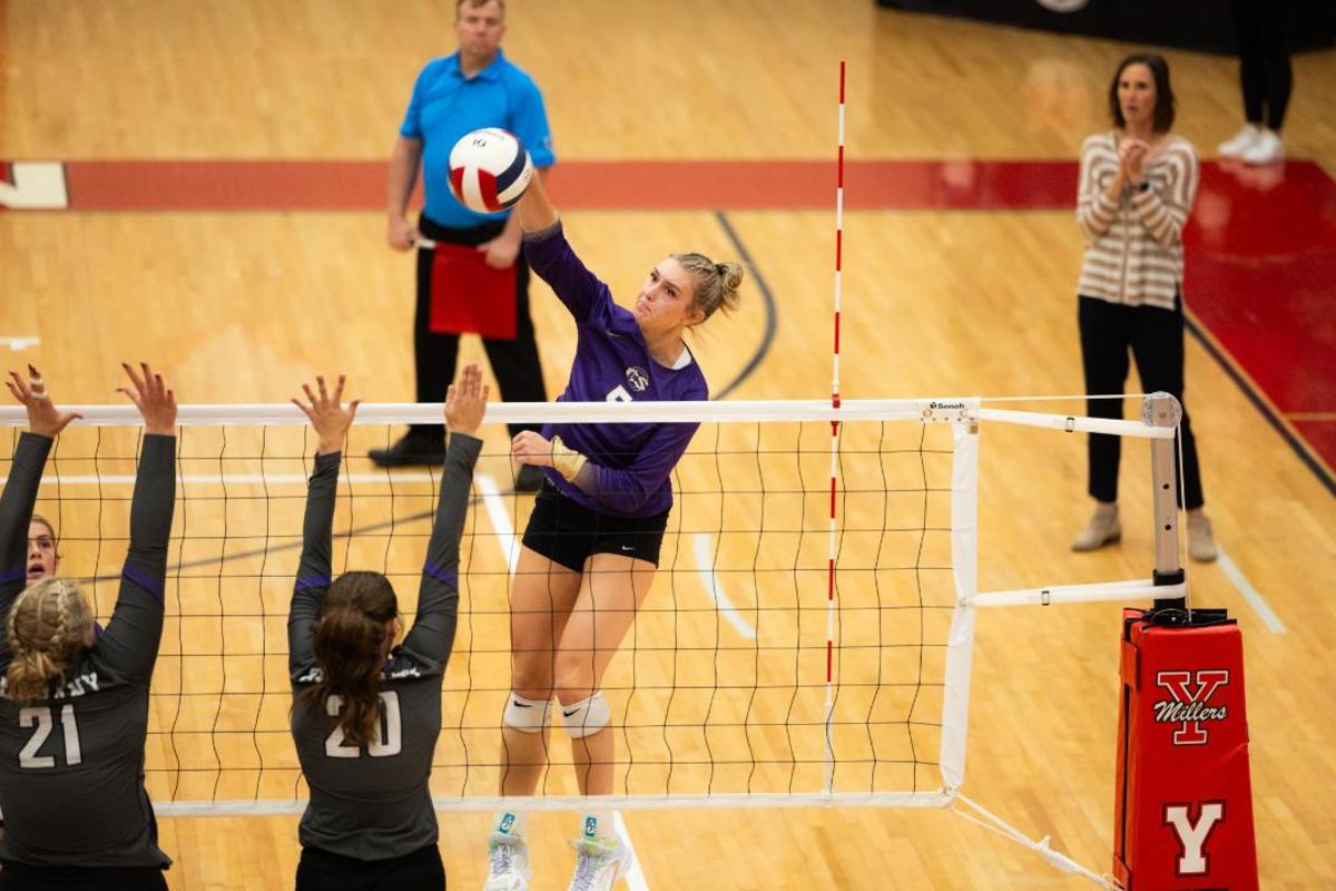 Community Christian senior outside hitter Landry Braziel leaps and swings for a kill in the Class 4A volleyball state championship match Saturday in Yukon.
